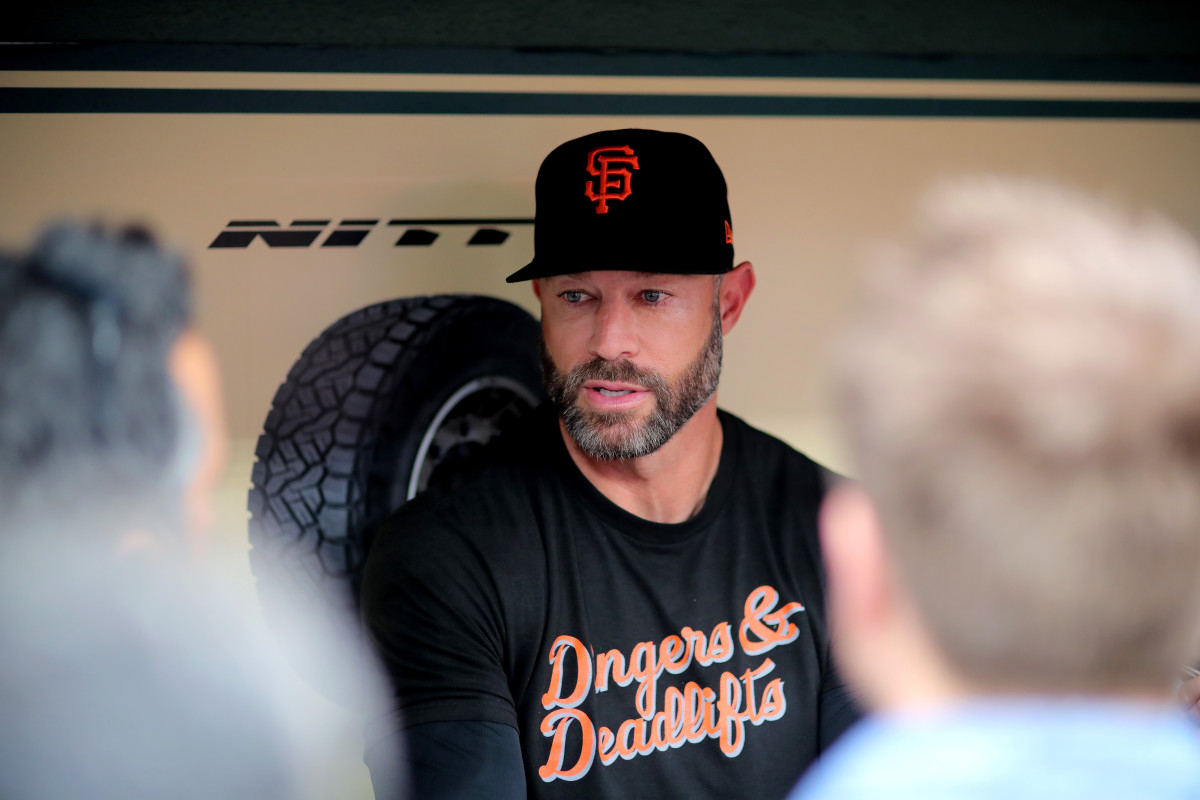 SF Giants manager Gabe Kapler answers questions from the media in the dugout prior to a game against the Houston Astros. (2023)